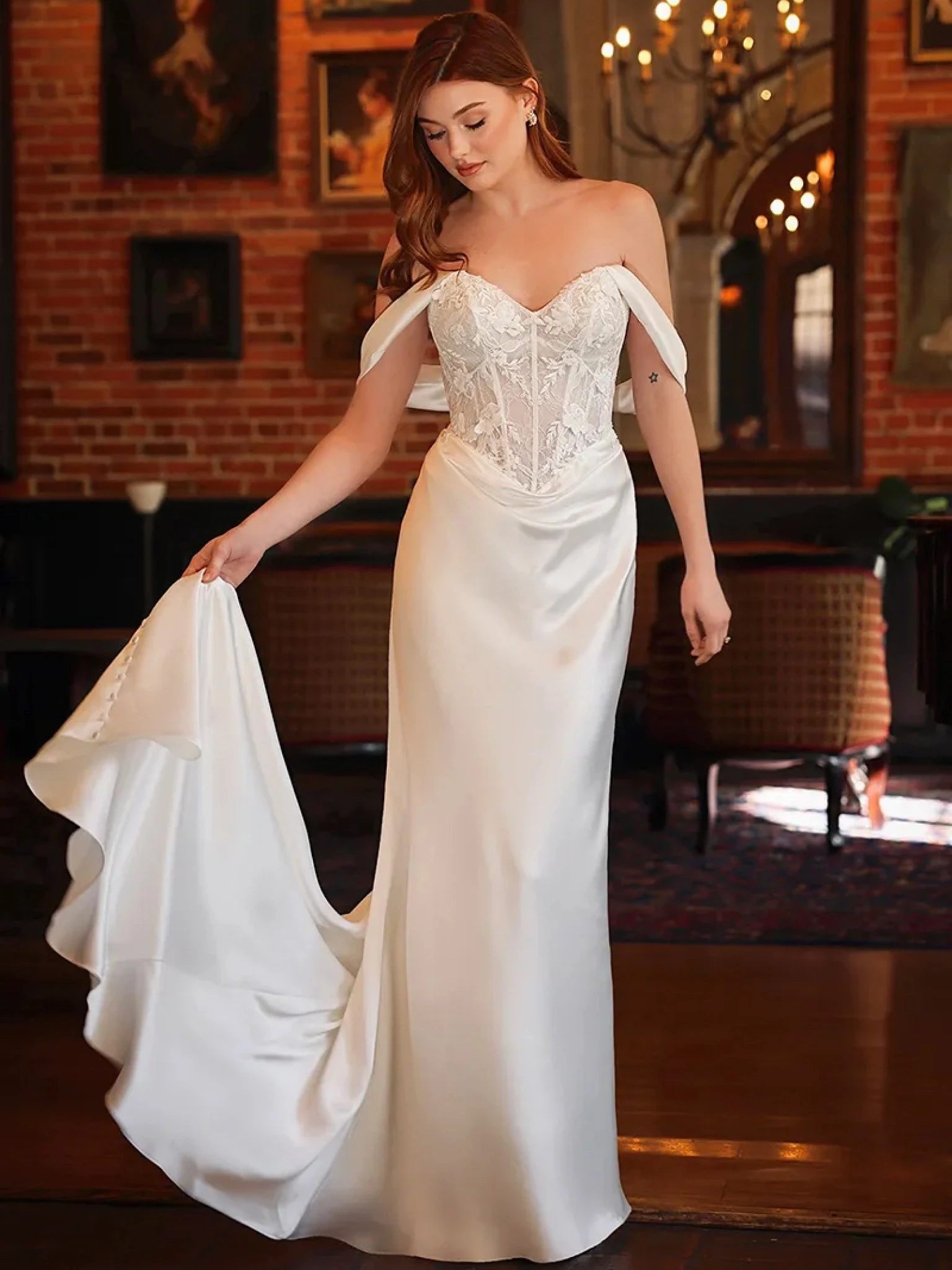 Сouple wearing a white gown and a black suit