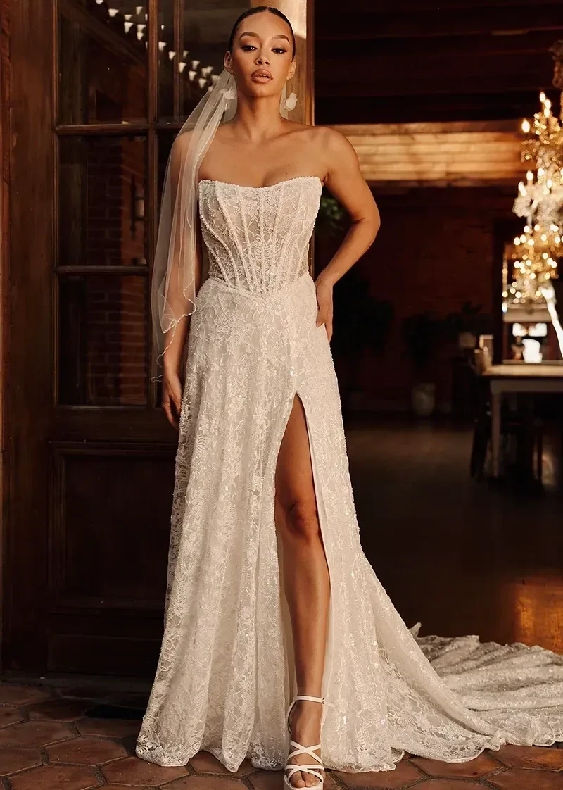 Model wearing a gown by essense of australia