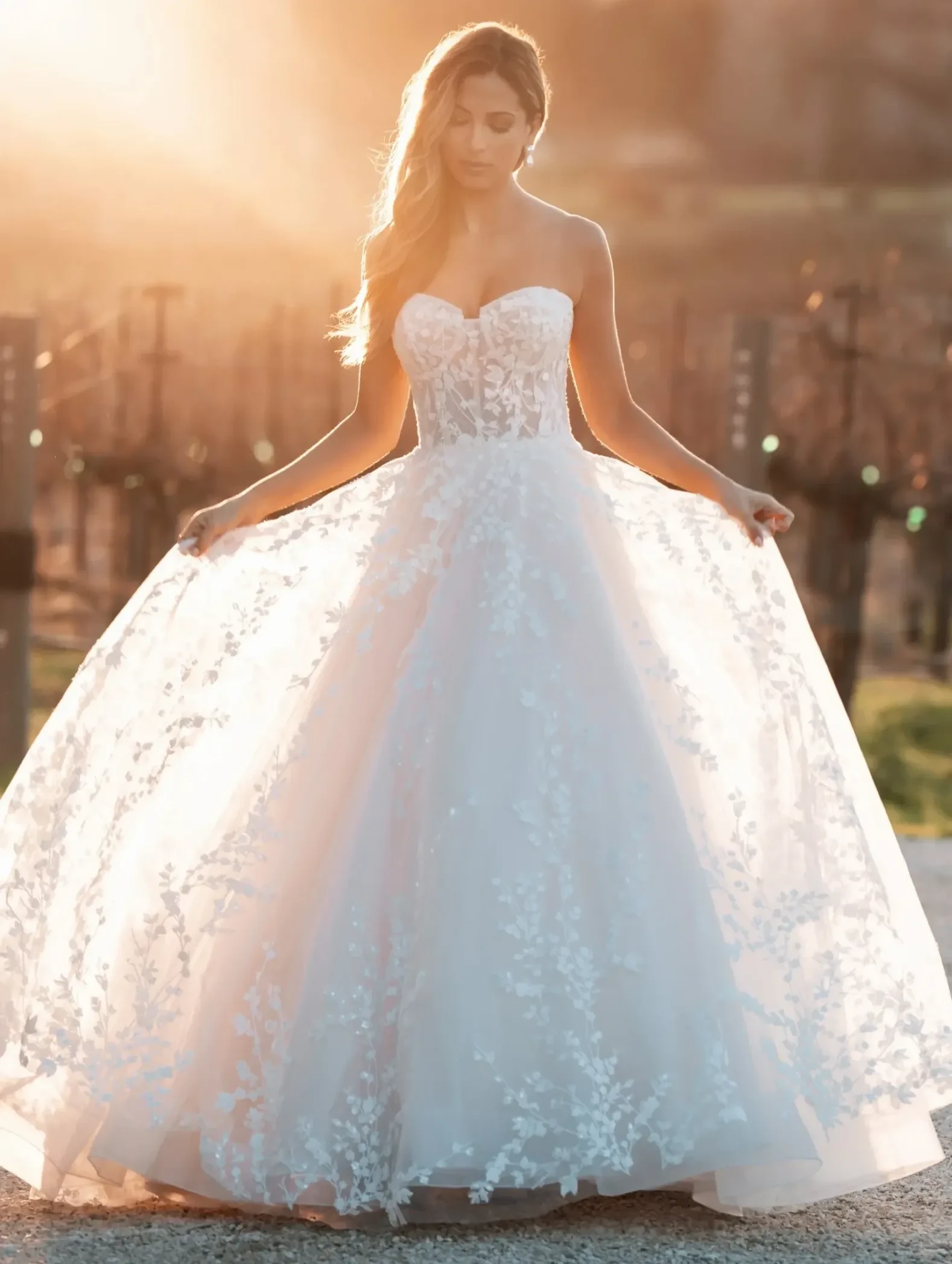 Model wearing a gown by allure