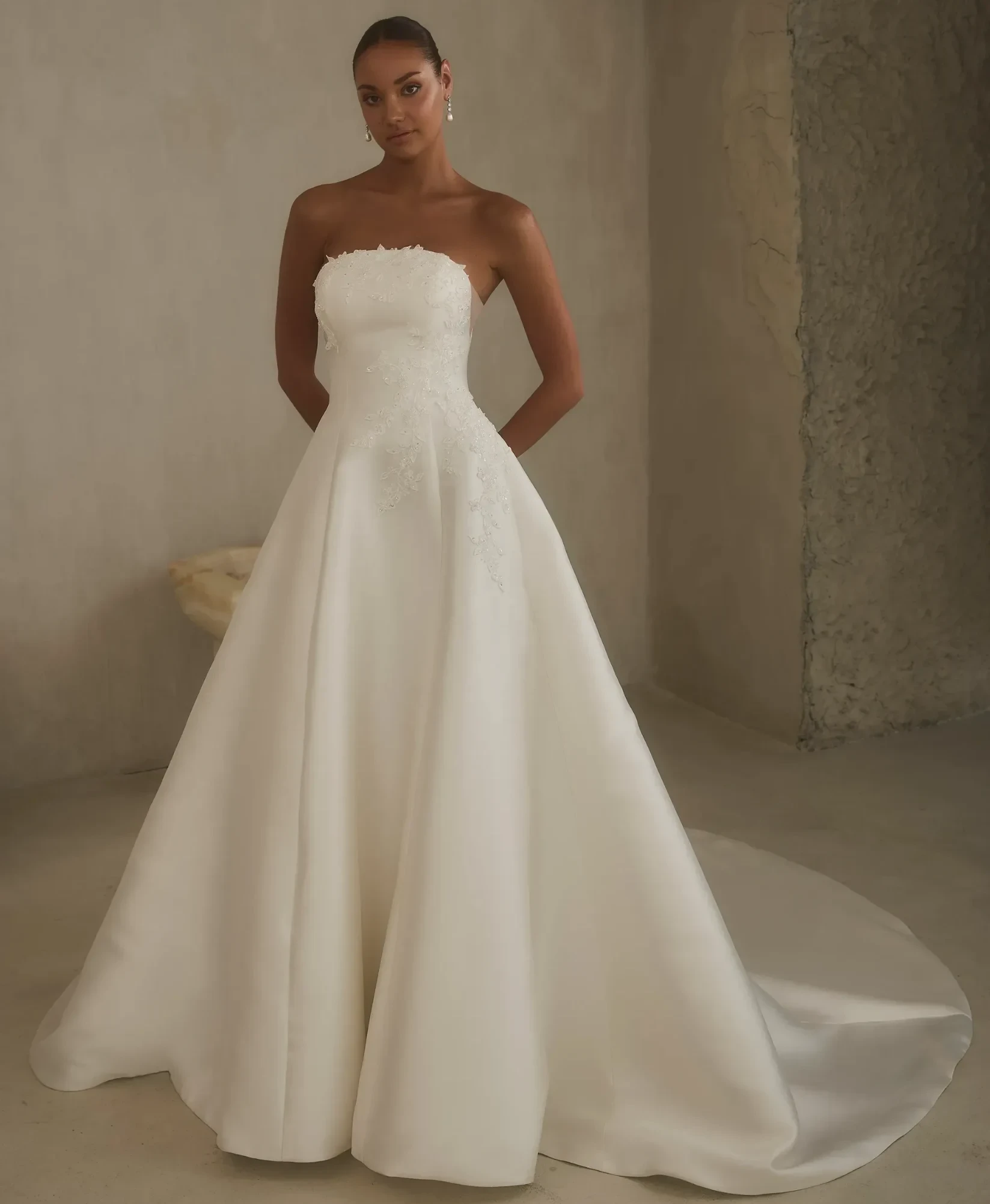 Model wearing a gown by casablanca