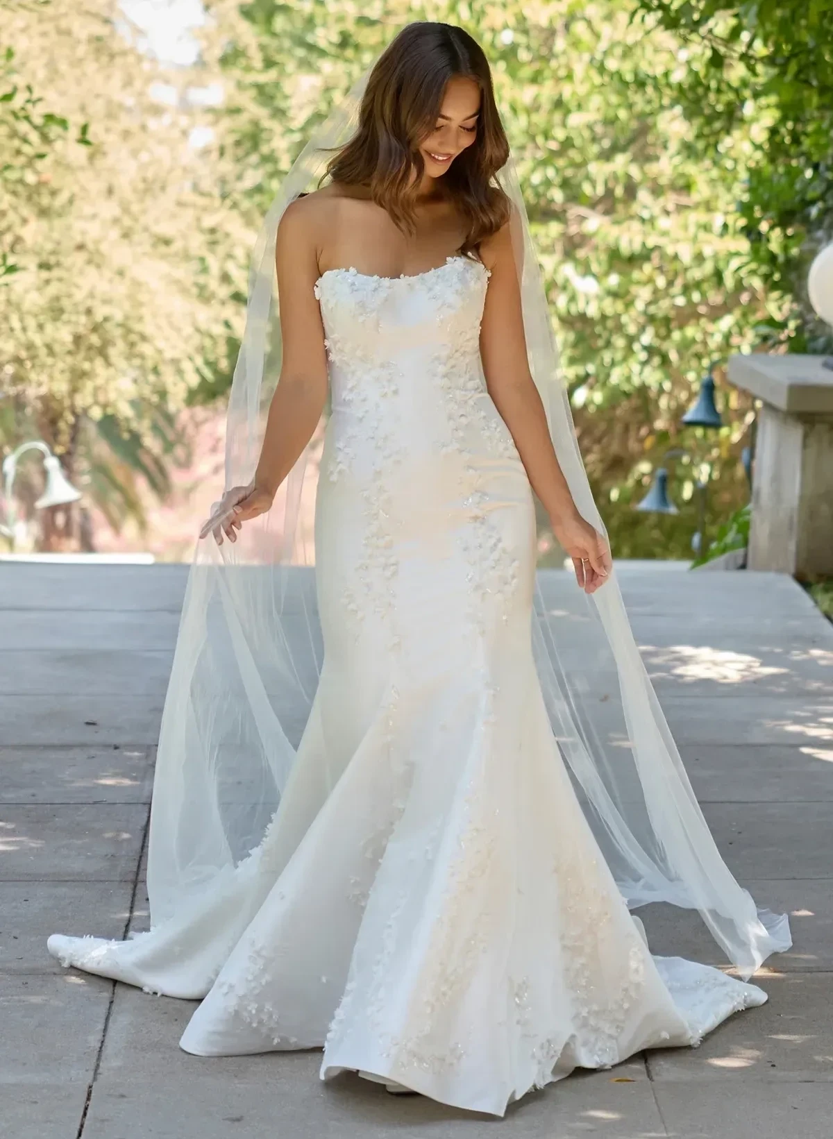 Сouple wearing a white gown and a black suit