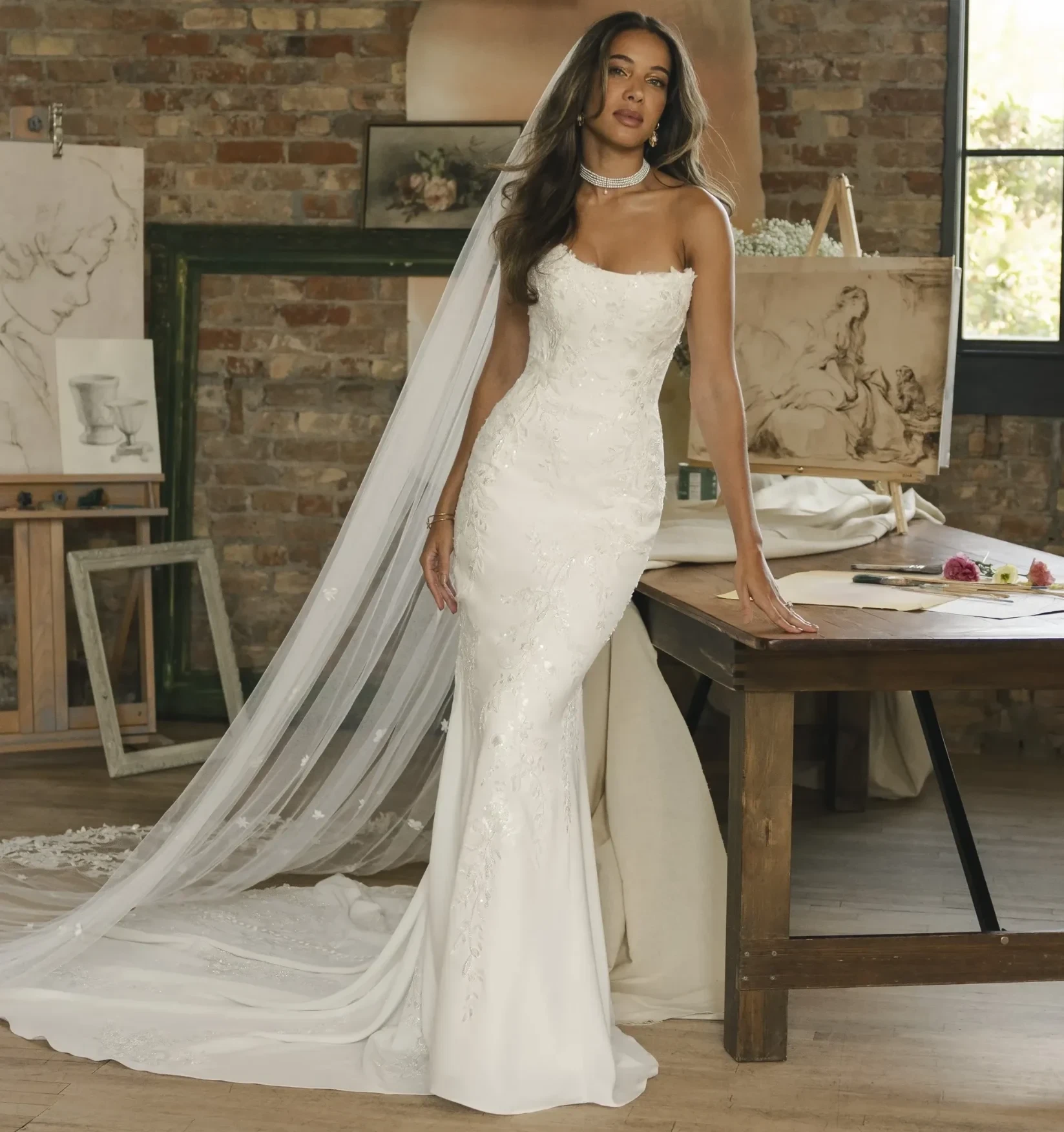 Model wearing a gown by maggie sottero